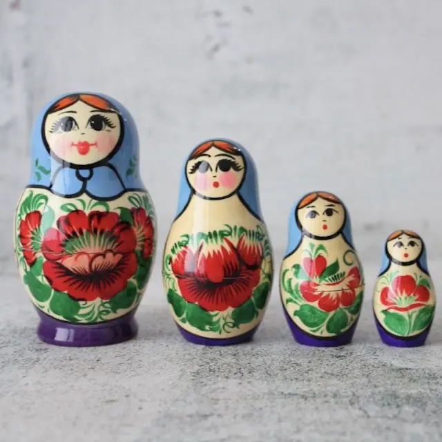 A set of Russian nesting dolls getting smaller from left to right